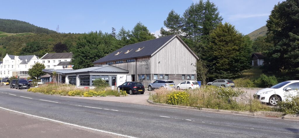Photograph of the 3 Villages Hall with carpark